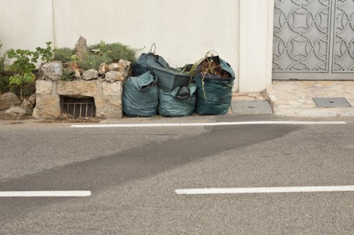 Construction site with waste clearance services in Pimlico